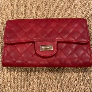 Red vegan leather clutch with shoulder strap